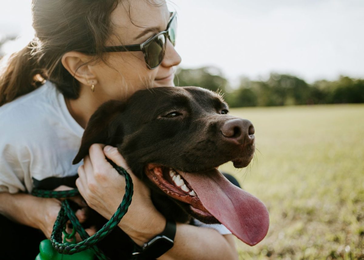girl hanging out with her dog